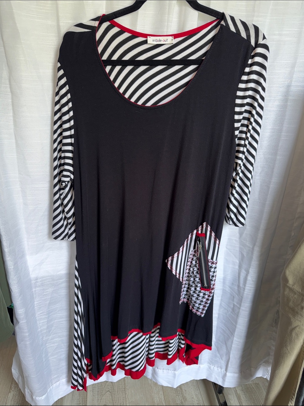 Black High-Low Dress with Striped Sleeves and Red Trim Accents